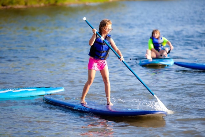 Try the Invigorating Sport of Paddleboarding in Big Bear’s Alpine Waters
